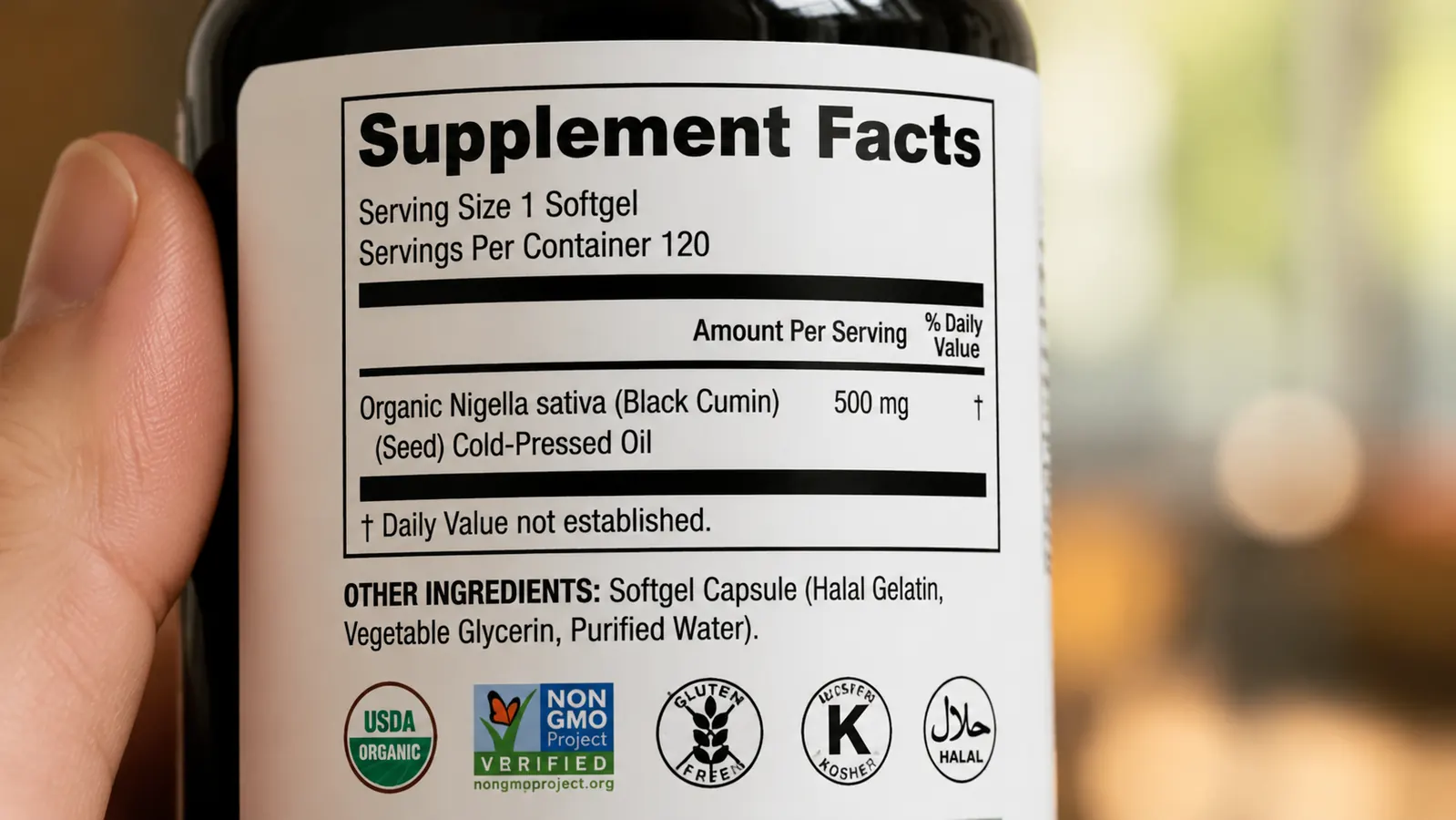 Supplement label close-up showing Supplement Facts panel with serving size and oil content
